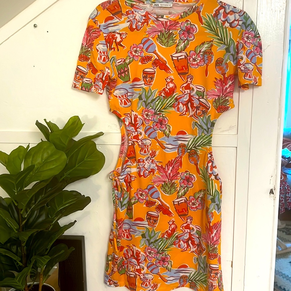 Mini dress with cut out sides